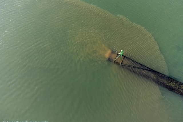 Southern Water's Budds Farm outfall photographed pouring out untreated sewage at 3.42pm on October 21 2021. Picture: Chris Pearsall Commercial Photography