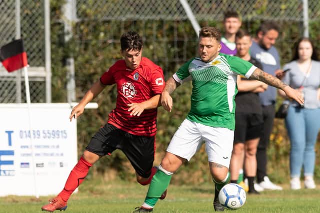 Locks Heath's Connor Johnson, left, battles for the ball in the win over Moneyfields Reserves earlier this month. Picture: Keith Woodland (110921-236)