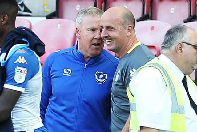 Pompey boss Kenny Jackett, left, and his predecessor Paul Cook. Picture: Joe Pepler