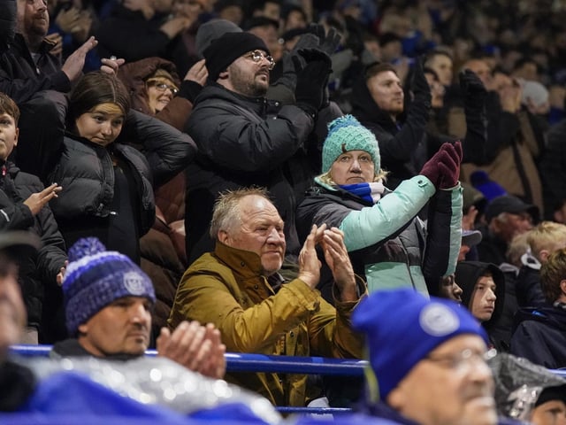 Pompey fans braved terrible weather conditions on New Year's Day to cheer the Blues to victory against Swansea.