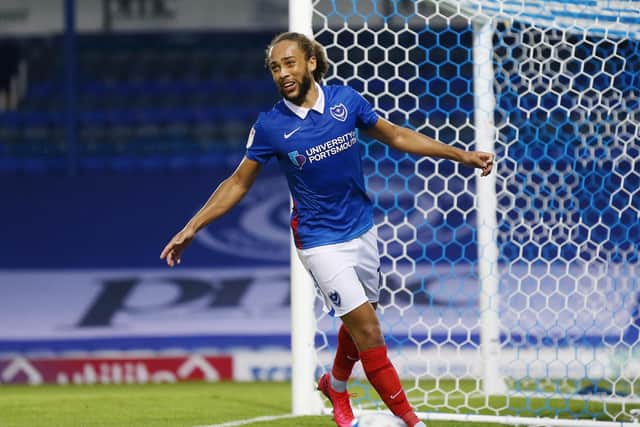 Marcus Harness celebrates his first goal in Pompey's EFL Trophy victory over Colchester. Picture: Joe Pepler