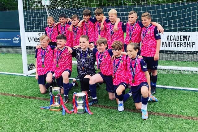 Hawks celebrate their Hampshire Saturday Under-12 Cup win