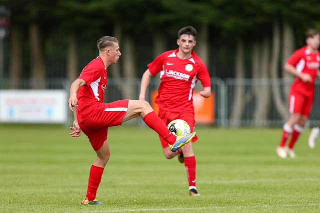 New Horndean signing Zak Willett on the ball against Hartley Wintney. Picture: Chris Moorhouse