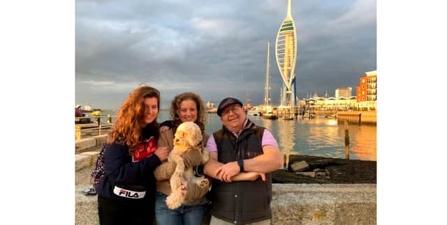 Paul Livingston with (left) daughter Eleanor, wife Kate and Poppy the dog