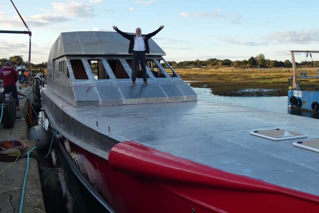 Team Britannia’s round the world superboat Excalibur has hit the water for the first time at a boatyard at Hayling Island. Pictured is Alan Priddy on the boat.
Picture: Team Britannia