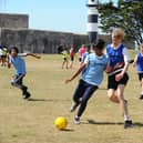 The Priory School Year 10s playing football. Picture: Sarah Standing (160622-6788)