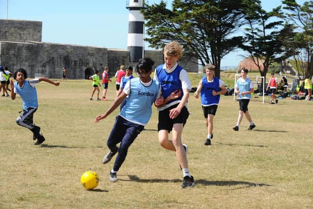 The Priory School Year 10s playing football. Picture: Sarah Standing (160622-6788)