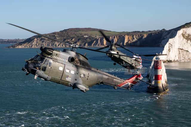 A formation flight of specially painted Chinook and Puma helicopter flew across the south east, visiting landmarks in Portsmouth, the Isle of Wight, Dover and London.
Image by Cpl Tim Laurence RAF.