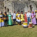 The delegatetion of Garifuna people at Portchester Castle, along with Professor Kate Astbury and Abigail Coppings from the University of Warwick (centre). Picture: Mike Cooter (080921)