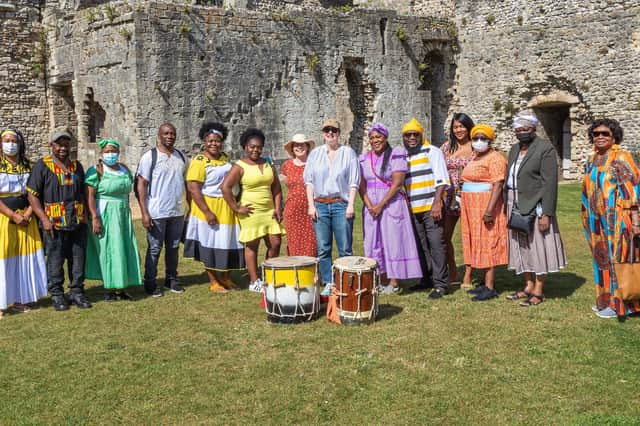 The delegatetion of Garifuna people at Portchester Castle, along with Professor Kate Astbury and Abigail Coppings from the University of Warwick (centre). Picture: Mike Cooter (080921)
