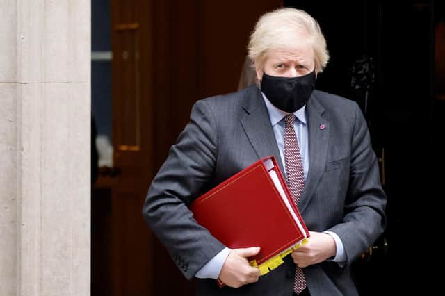 Prime Minister Boris Johnson and his Government have produced numerous U-turns in recent months. Now they need to produce another one if the National League South and North seasons are to be completed. Pic: Tolga Akmen/AFP via Getty Images)
