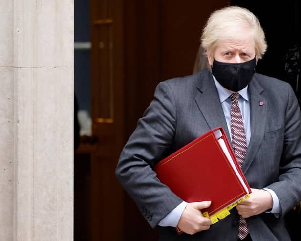 Prime Minister Boris Johnson and his Government have produced numerous U-turns in recent months. Now they need to produce another one if the National League South and North seasons are to be completed. Pic: Tolga Akmen/AFP via Getty Images)