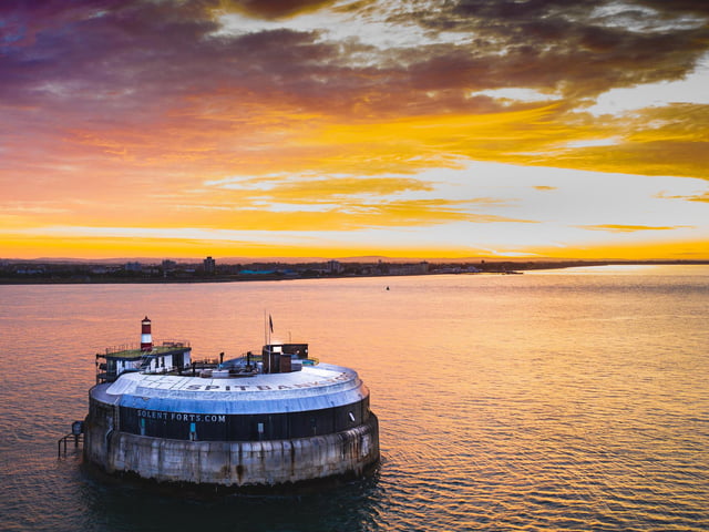 The sunrise over Spitbank Fort. Credit: @Brian.Bracher and @compass_aerial