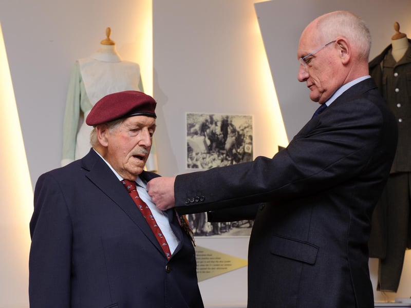 Arthur Bailey is presented with his medal from Captain Francois Jean, the consul honoraire of France, on behalf of French president Francois Hollande.
At a ceremony at D-Day Museum, Southsea, veterans are presented with France's highest military honour Legion d'Honneur for their heroism during the D-Day landings in Normandy. 2015.
Picture: Allan Hutchings