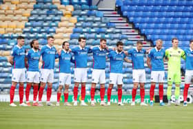 Ben Close and his Pompey team-mates pay tribute to Alan McLoughlin ahead of Sunday's match against Accrington. Picture: Joe Pepler