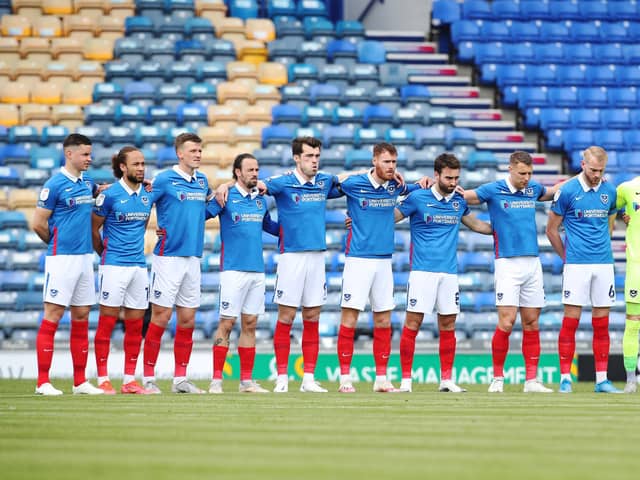 Ben Close and his Pompey team-mates pay tribute to Alan McLoughlin ahead of Sunday's match against Accrington. Picture: Joe Pepler