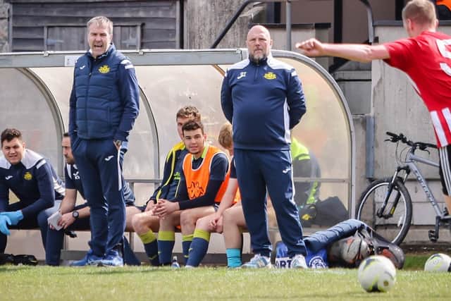 Fraser Quirke, left, and Glenn Turnbull in the same Victory Stadium dugout for Moneyfields last season. This weekend they will be in opposite dugouts.