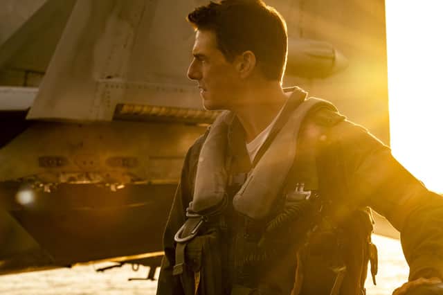 Tom Cruise as Captain Pete "Maverick" Mitchell.