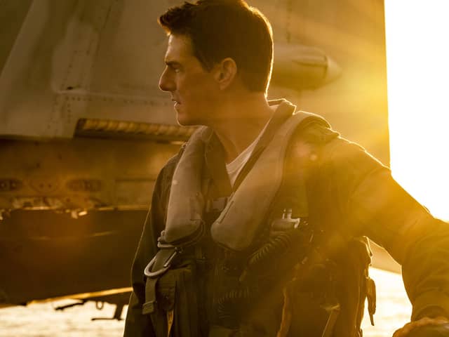Tom Cruise as Captain Pete "Maverick" Mitchell.