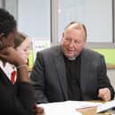 The Rev Jonathan Jeffery, vicar of Leigh Park and Warren Park, with pupils from Park Community School