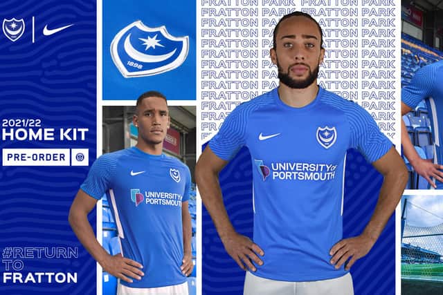Marcus Harness, centre, models Pompey's new home shirt for the 2021-22 season. Picture: Portsmouth FC