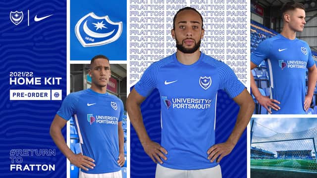 Marcus Harness, centre, models Pompey's new home shirt for the 2021-22 season.  Picture: Portsmouth FC