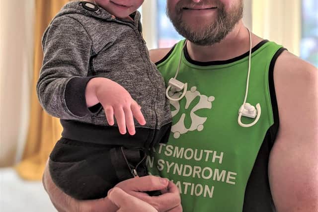 Andrew Osborne, who volunteers for Portsmouth Down Syndrome Association, with his son Teddy