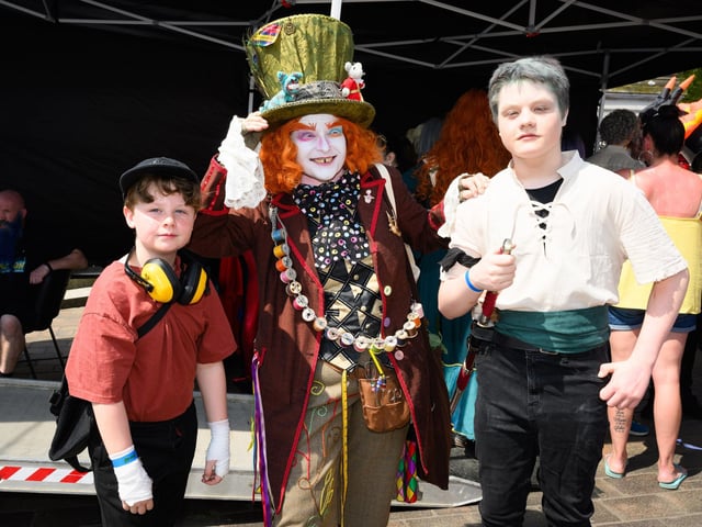 The Mad Hatter is joined by Kristopher and Caleb. Picture: Keith Woodland (110521-209)