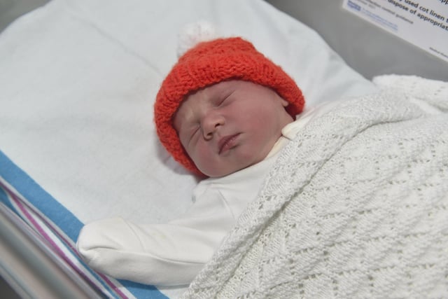 Eva Cooke born on Christmas Day at 7.38am weighing 6lb 14oz to parents Charlotte and Sam Cooke both 34 from Bournemouth. Eva was born via a surrogate from Havant. 

Picture: Sarah Standing