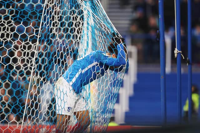 Marcus Harness sums up the feeling at Fratton Park after the Blues lost 2-1 at home to MK Dons
