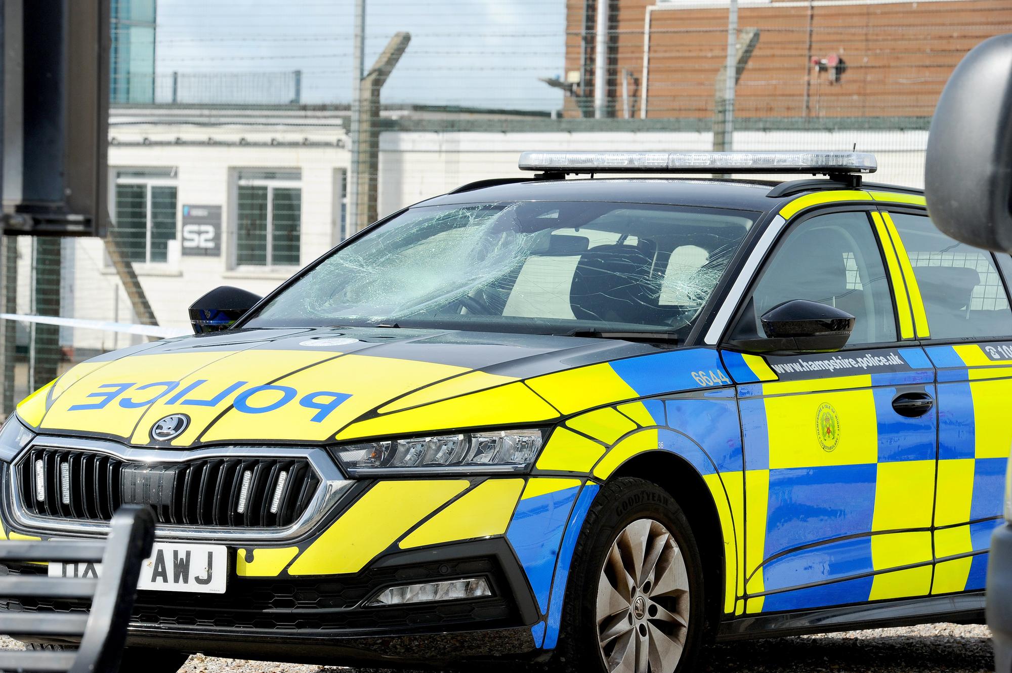 Seven police officers assaulted during 'frightening experience' as hundreds of protesters block migrants