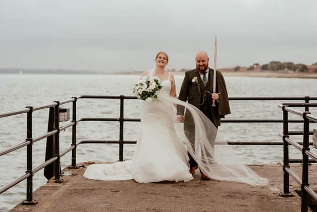Stephanie and Adam Bygrave-White, from Fratton, were married at the Square Tower, in Old Portsmouth on August 22, 2022. Picture: Carla Mortimer Photography.