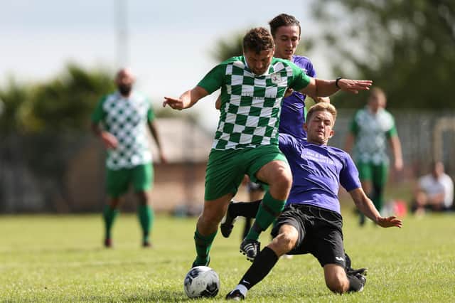 Two-goal Harry Potter (green) in action against East Lodge in the Mid-Solent League game at Havant Academy. Picture: Chris Moorhouse