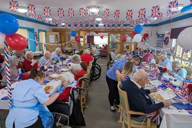 Residents at RCC enjoy a street party lunch