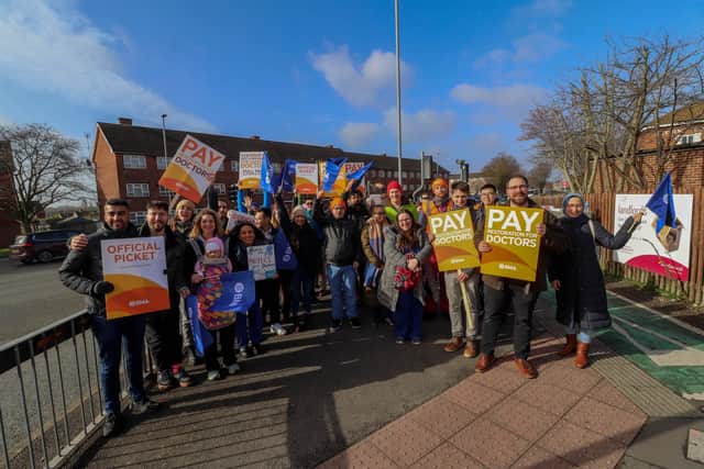 Junior doctors and their families and friends outside the entrance to QA Hospital, Cosham, Portsmouth, at the previous junior doctor strikes. 
Picture: Habibur Rahman