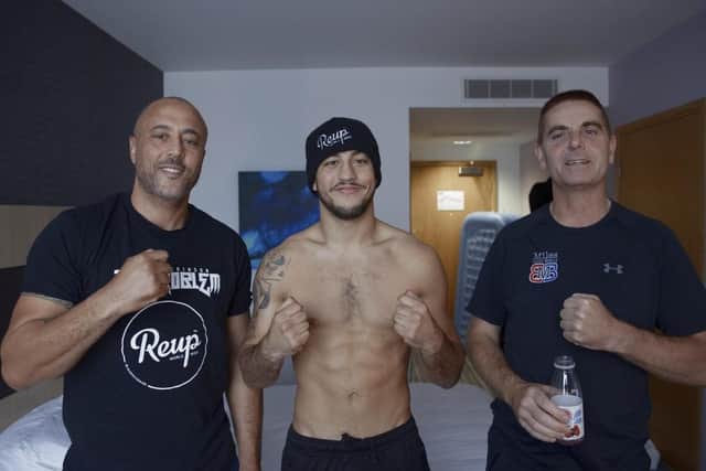 Father and trainer Michael Ballingall, left, with son Michael McKinson, centre, and trainer Miles Harding