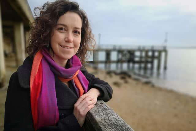 Bryony Wildblood, Interfaith Minister and Celebrant, at Old Portsmouth, where many families leave memorials to their loved ones