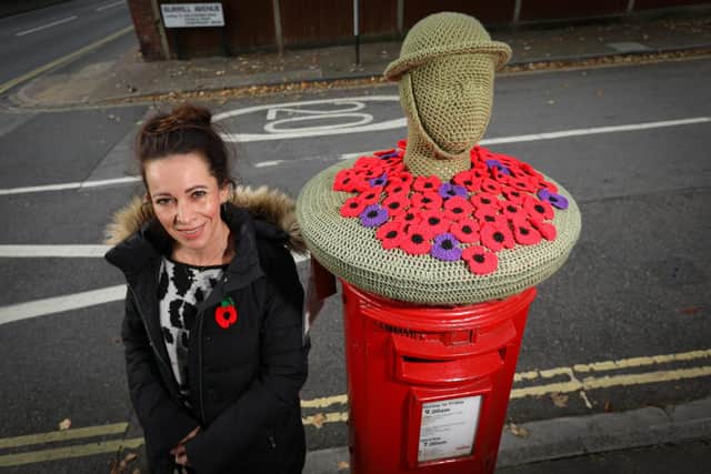 Nicky Stoneman with her crocheted post box 'topper' on a Remembrance theme, Burrill Avenue. Picture: Chris Moorhouse   (jpns 081121-20)