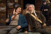 Tom Rosenthal (Khlestakov) with Lloyd-Hutchinson (The-Mayor) in The Government Inspector at Chichester Festival Theatre. Photo by Ellie Kurttz
