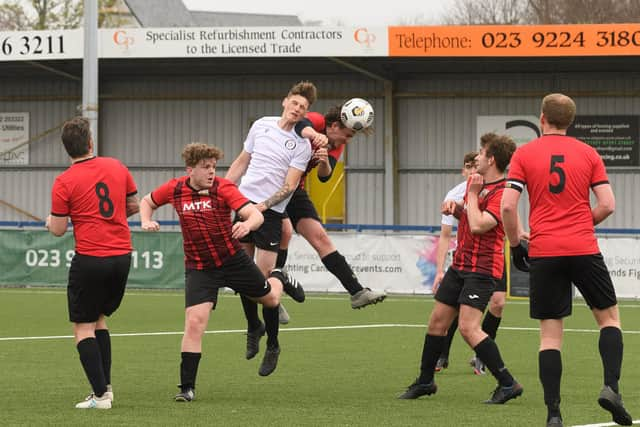 Horndean United (red/black) v East Lodge Youth. Picture: Keith Woodland