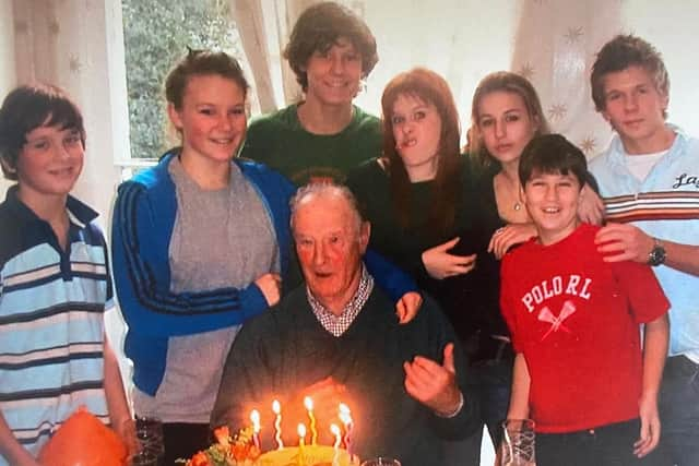 Former Portsmouth Grammar School teacher John Hopkinson with his family