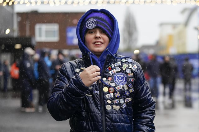 Braving the elements before kick-off.