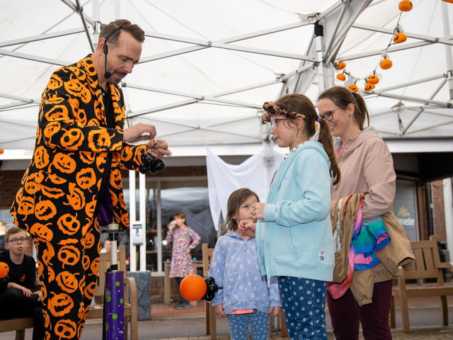 People flocked to Port Solent on Thursday to enjoy the half term entertainment, including arts and craft, face painting and magic shows.
Pictured - Silly Scott performing his magic show
Photos by Alex Shute