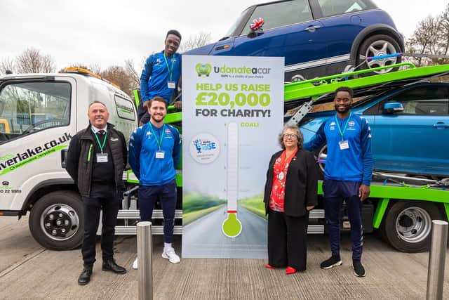 The fundraisiing barometer at Silverlake. Pictured: Allen Prebble (Managing Director), footballers Vincent Harper and Joe McConnell, Councillor Jacqui Rayment (Sheriff of Southampton) and  Christian Maghoma from Eastleigh Football Club. Picture: Mike Cooter (181121)