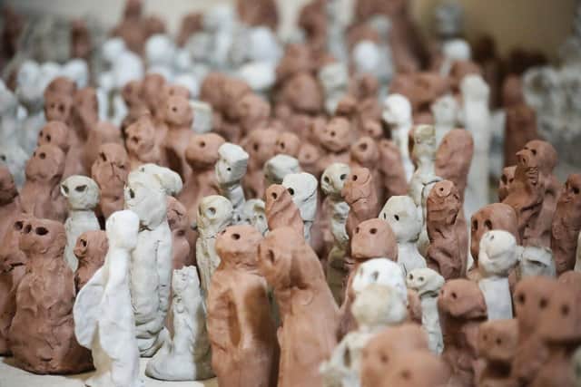 Some of the clay sculptures that are part of the art installation
