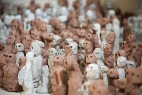Some of the clay sculptures that are part of the art installation