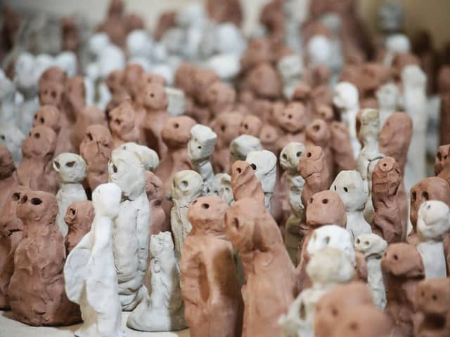 Some of the clay sculptures that are part of the art installation