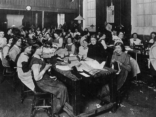 Seamstresses at work at Rowe and Co, High Street, Gosport, 1913-14