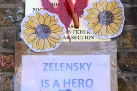 COURAGE: The sunflower emblem of Ukrainian resistance on the walls of the Russian embassy in London.  Picture: Getty