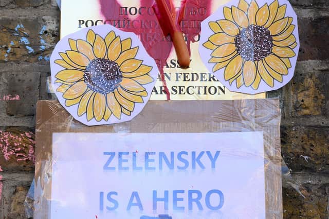 COURAGE: The sunflower emblem of Ukrainian resistance on the walls of the Russian embassy in London. Picture: Getty